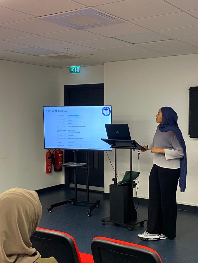 A doctor presents to students at an Access to Medicine workshop