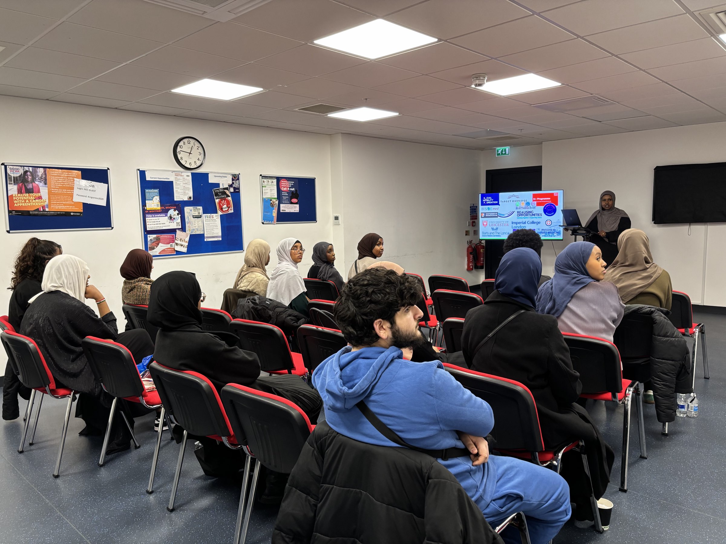 Students listen to a speaker at an Access to Medicine workshop in 2024
