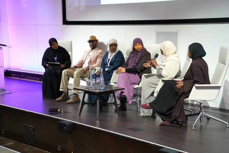 A panel on stage at ESMC 2026